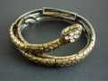 COILED SNAKE UPPER ARM BRACELET BRASS TONED & FAUX WHITE