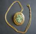 BROOCH PENDANT GREEN QUARTZ ON GOLD TONED SETTING & CHAIN